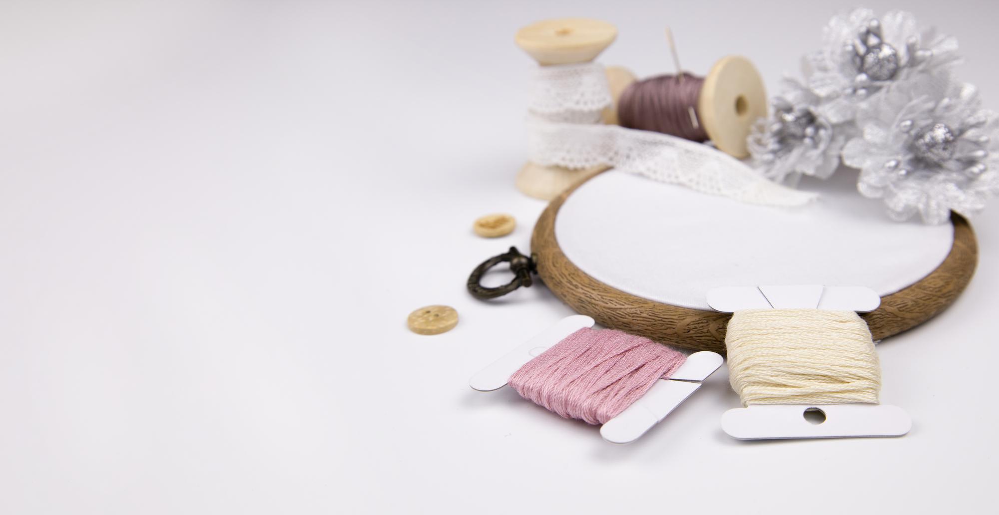studio workspace with embroidery hoop