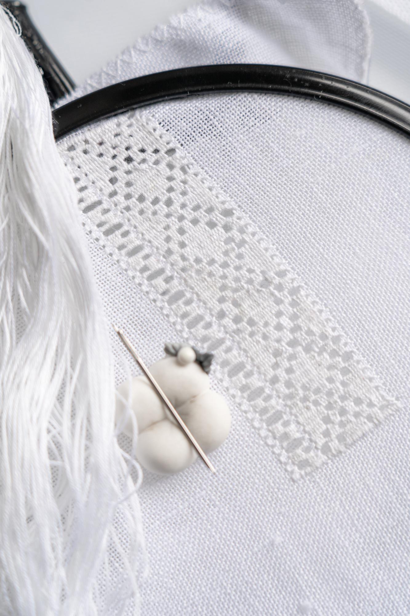 linen with intricate floral embroidery after